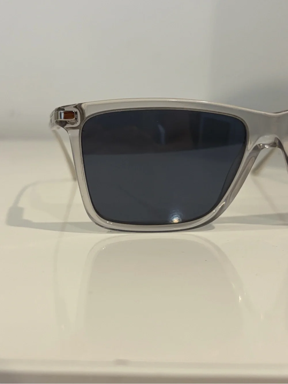 Prada Men’s Clear Frame Sunglasses with Dark Blue Lenses